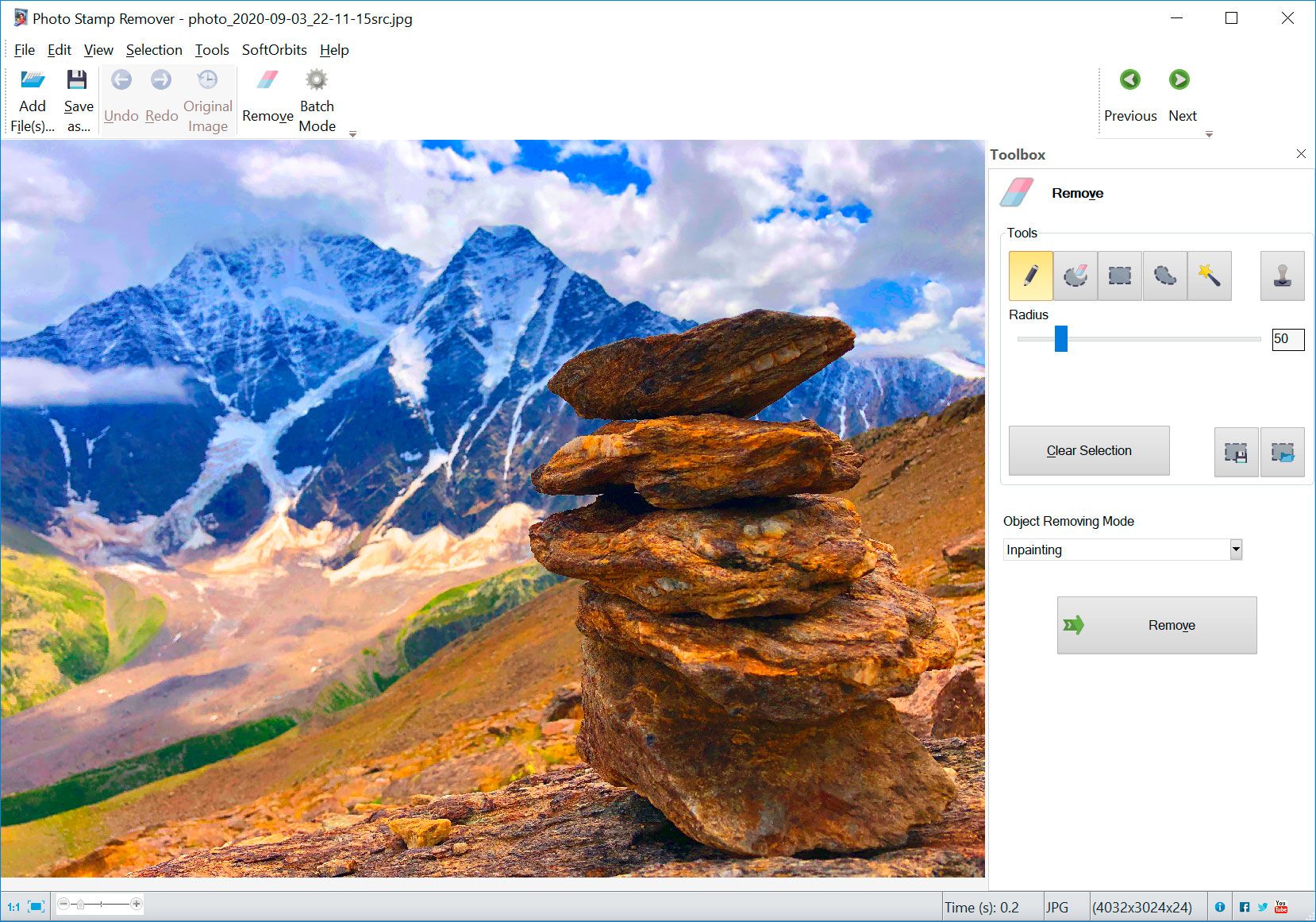 Eliminar marca de agua de la foto - después.